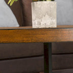 Table basse ovale contemporaine en bois massif avec pieds croisés en métal