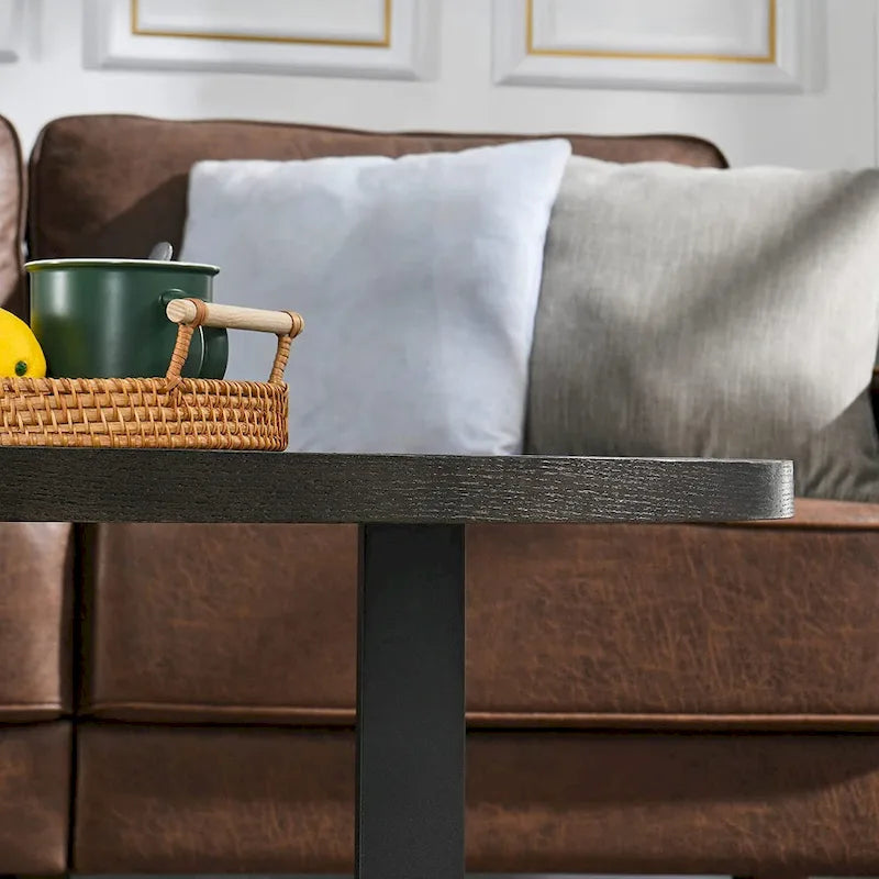 Table basse ovale contemporaine en bois massif avec pieds croisés en métal