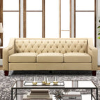 Canapé Mateo de style transitionnel, 209 cm de large, en cuir véritable, avec garniture cloutée et dossier capitonné.