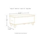 Banc de rangement Fossil Ridge Antique White à médaillon sculpté