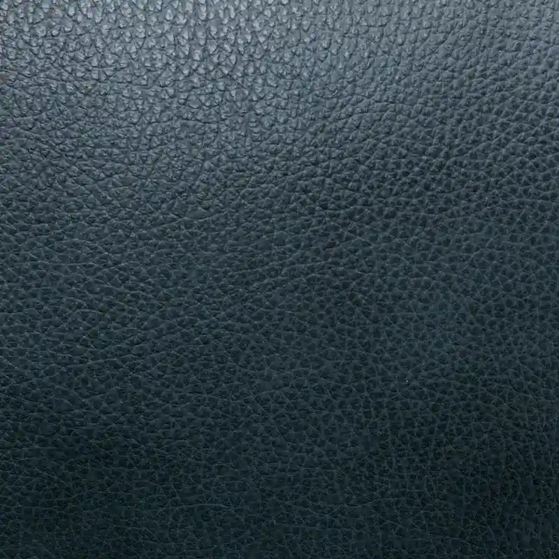 Fauteuil inclinable en cuir véritable avec dossier inclinable, accoudoirs et dossier confortables.