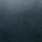 Fauteuil inclinable en cuir véritable avec dossier inclinable, accoudoirs et dossier confortables.