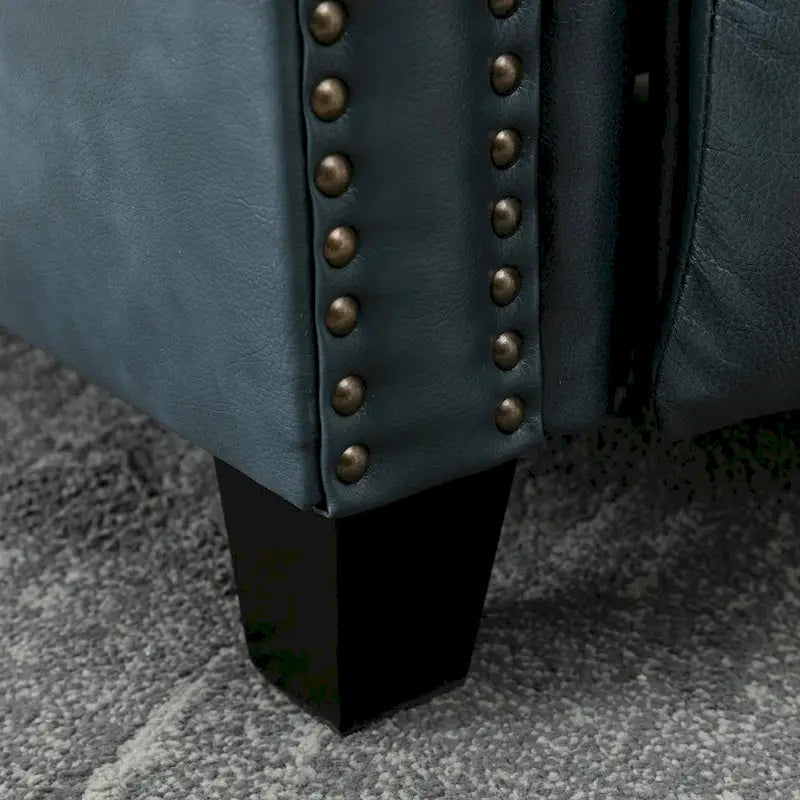 Fauteuil inclinable en cuir véritable avec dossier inclinable, accoudoirs et dossier confortables.