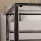 Table basse rectangulaire Glenn de SEI Furniture, en métal noir avec plateau et étagère inférieure en verre.