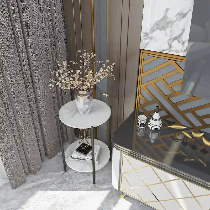 Table d'appoint ronde à deux niveaux en marbre, structure en métal noir.