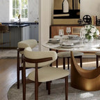 Table de salle à manger ronde moderne, plateau en pierre blanche brillante, pied en bronze carbone