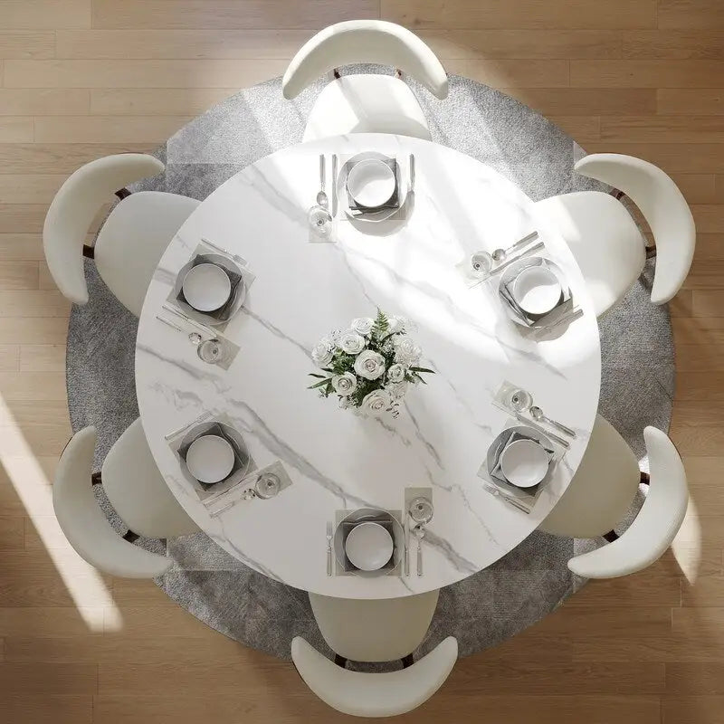 Table de salle à manger ronde moderne, plateau en pierre blanche brillante, pied en bronze carbone