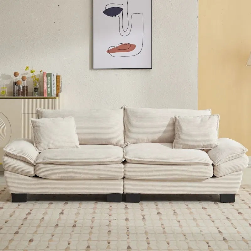 Canapé profond recouvert de velours côtelé