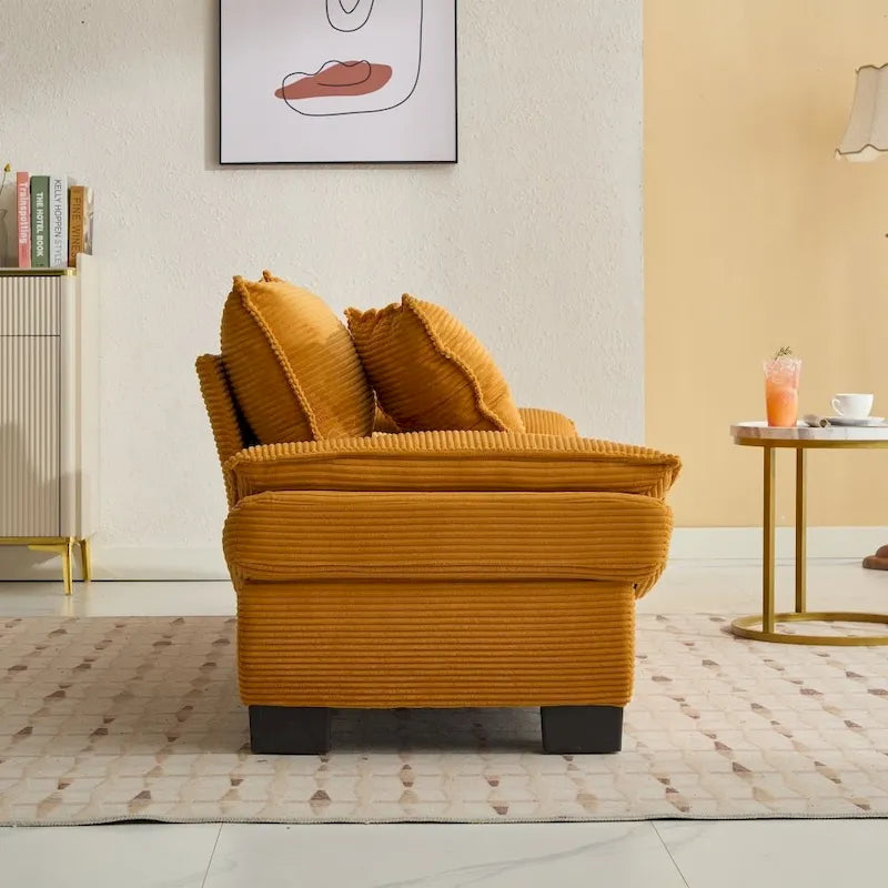 Canapé profond recouvert de velours côtelé